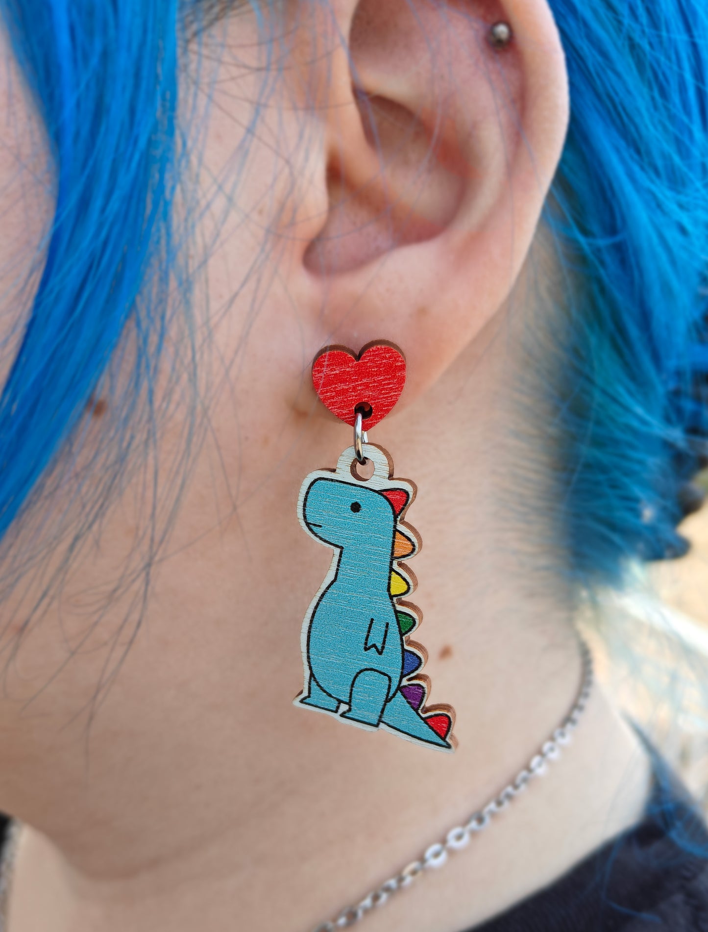 T-rex rainbow heart earrings